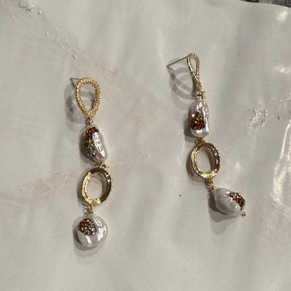 Elegant Gold and White Dangle Earrings